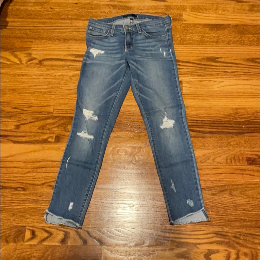 Flying Monkey light wash distressed jeans.